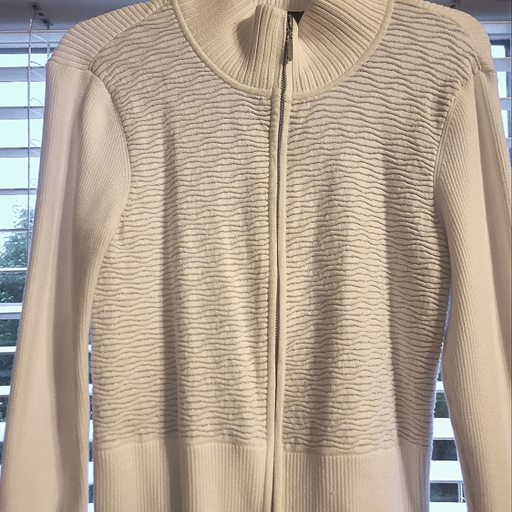 White House Black Market zip up jacket with a white  metallic pattern.